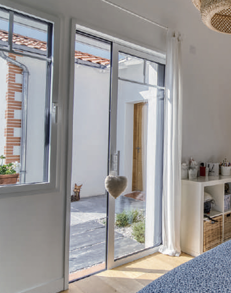 Baies coulissantes à galandage en aluminium KLINE à Chatignonville dans l'Essonne - La Fermeture Parisienne project-slider-image