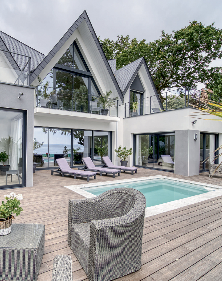 Baie vitrée coulissante en aluminium KLINE à Palaiseau (91) dans l'Essonne - La Fermeture Parisienne project-slider-image